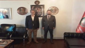 Abdülhamit Basrali `den Turgut Başdaş `a Anlamlı Ziyaret 